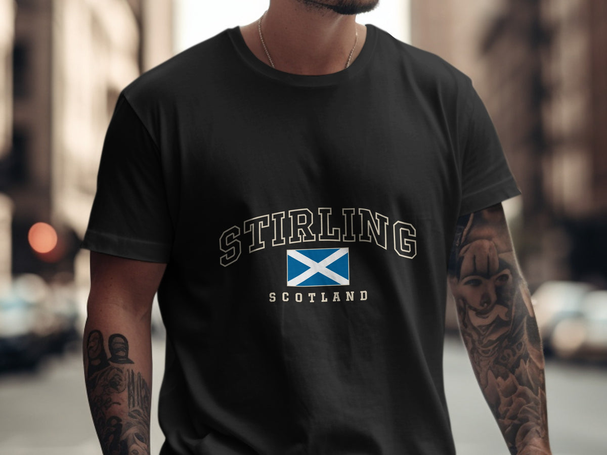 Model wearing the Black Stirling Scotland Comfort Colors T-shirt with the Scottish Saltire