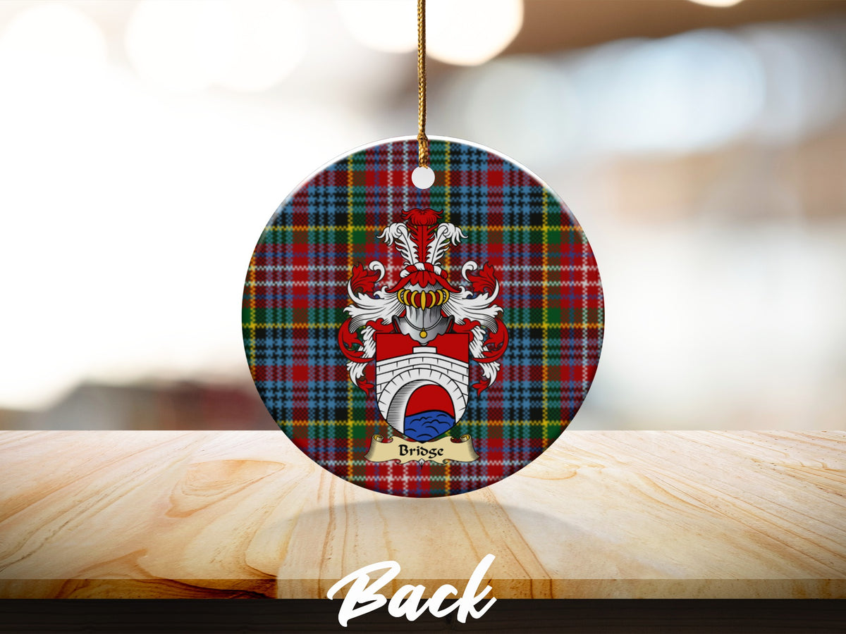 Round Bridge Scottish clan ornament with family crest on a Caledonia tartan background