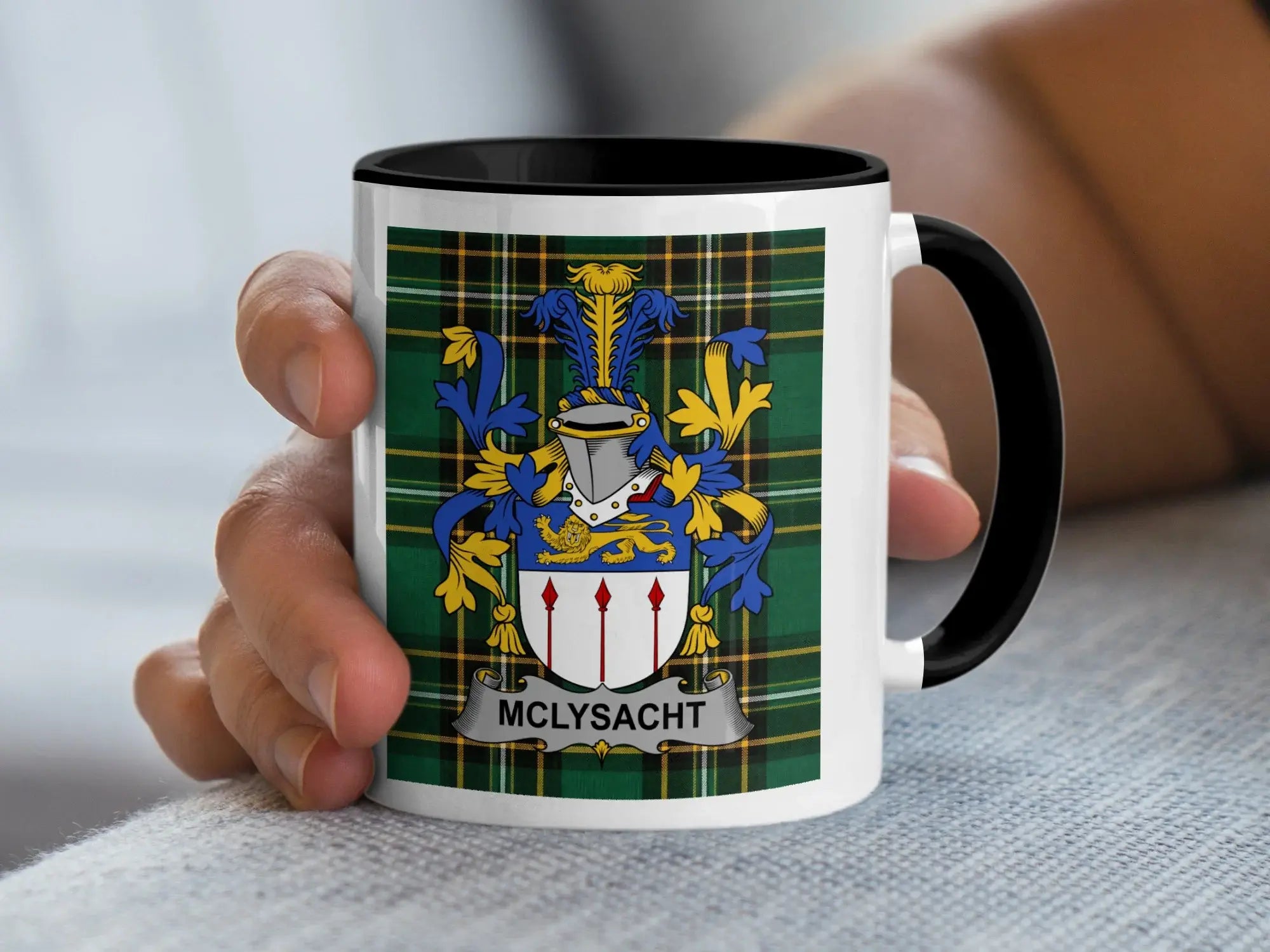 MCLYSACHT crest on white mug with black handle and rim.