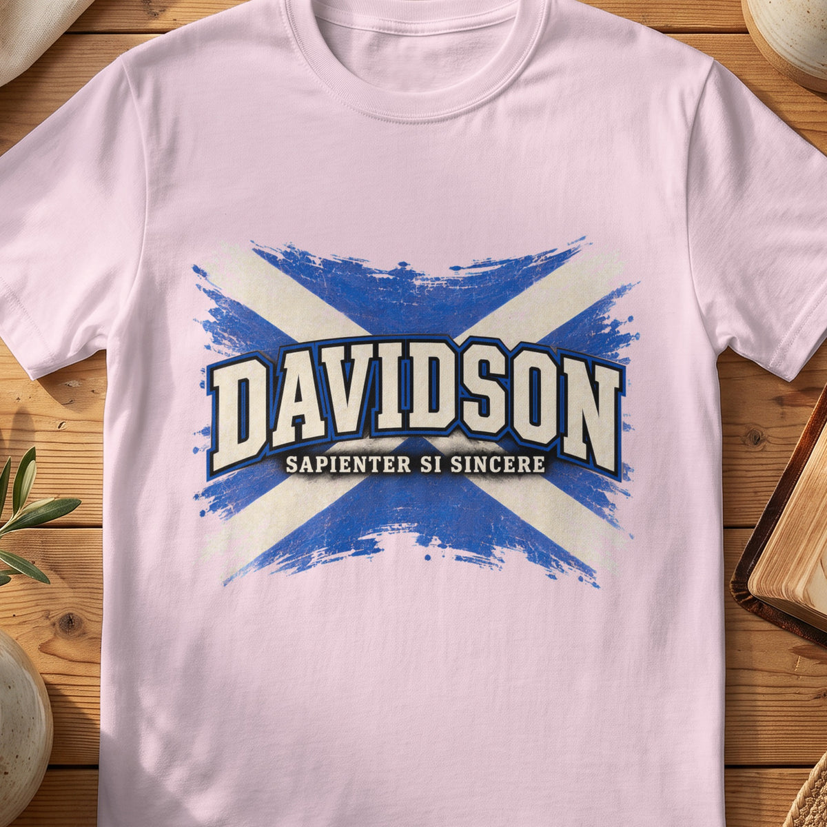 Davidson Scottish Saltire T-shirt in Light Pink, with distressed blue and cream flag and “Sapienter Si Sincere” lettering.
