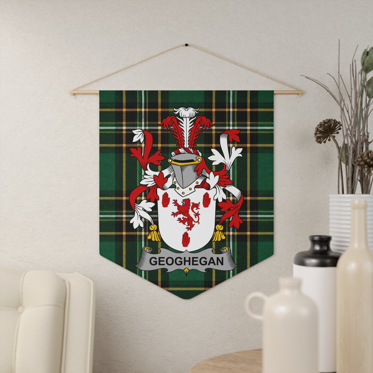 Geoghegan family crest banner with green tartan background and detailed heraldry.