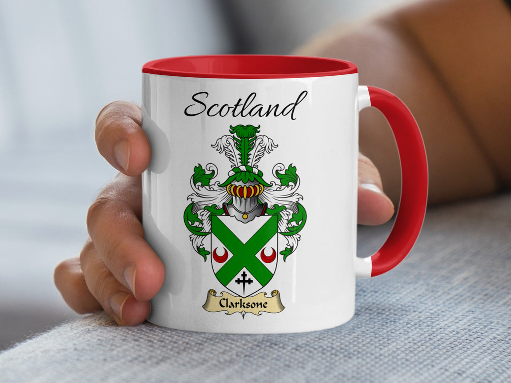 Red-accent Clarkesone Scottish surname mug with matching handle and interior and coat of arms artwork beneath “Scotland”.