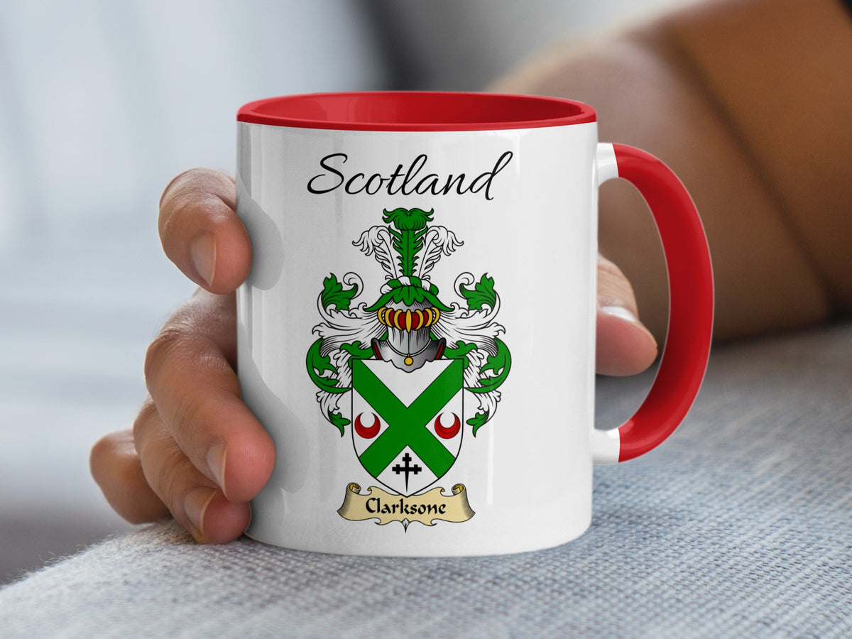 Red-accent Clarkesone Scottish surname mug with matching handle and interior and coat of arms artwork beneath “Scotland”.