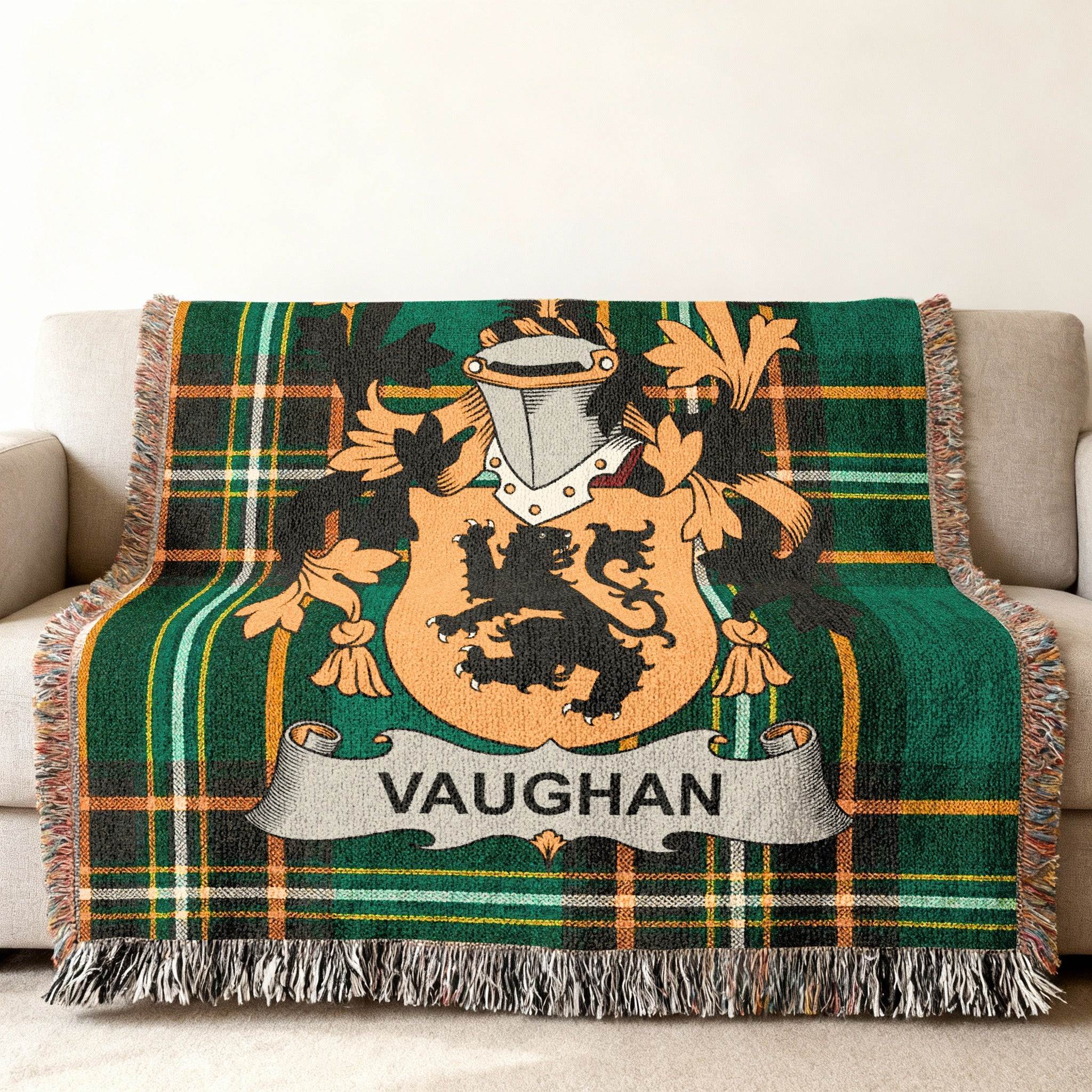 Green tartan blanket featuring the Vaughan family crest with a lion and shield.