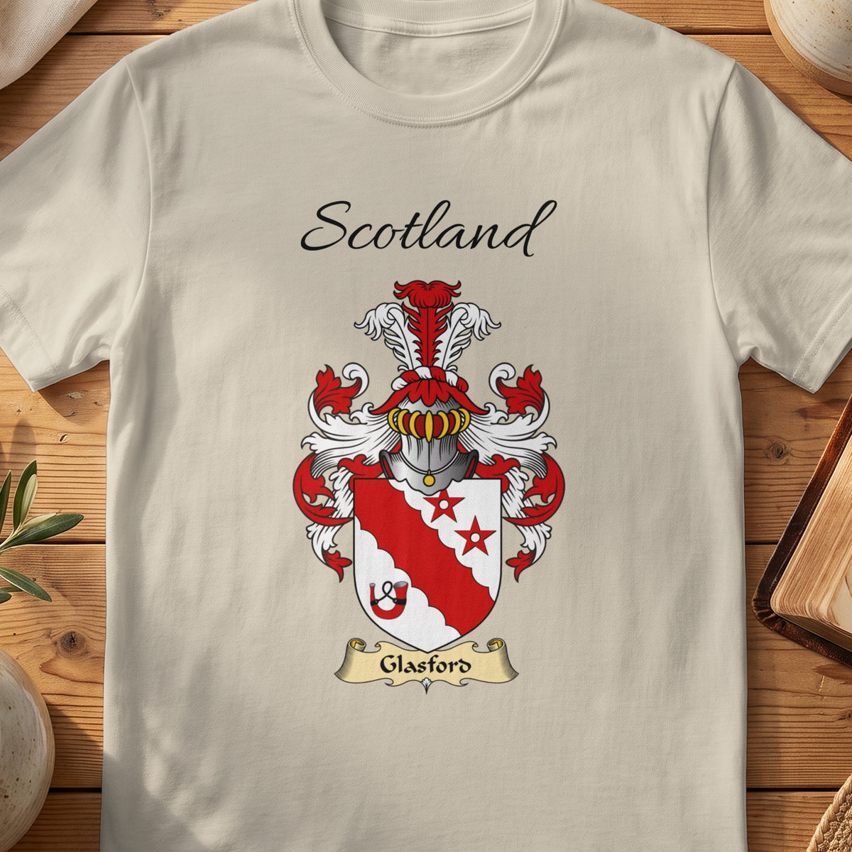 Sand Glasford Scottish family shield T-shirt featuring a red diagonal band with stars and a small wheel motif