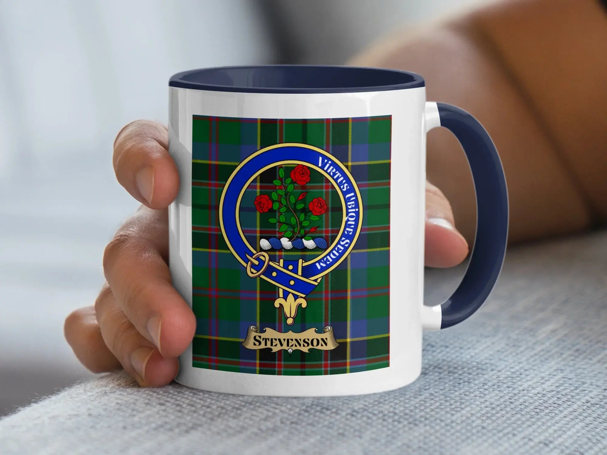 Stevenson family crest coffee mug with a tartan-background design