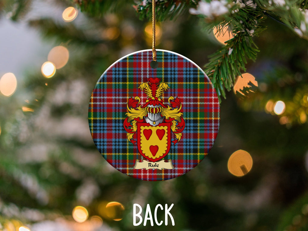 Rule ceramic ornament detail showing a double-sided family shield on a Caledonia tartan background