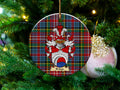 Bridge Scottish clan ceramic ornament with family crest on a Caledonia tartan background, hanging on a Christmas tree