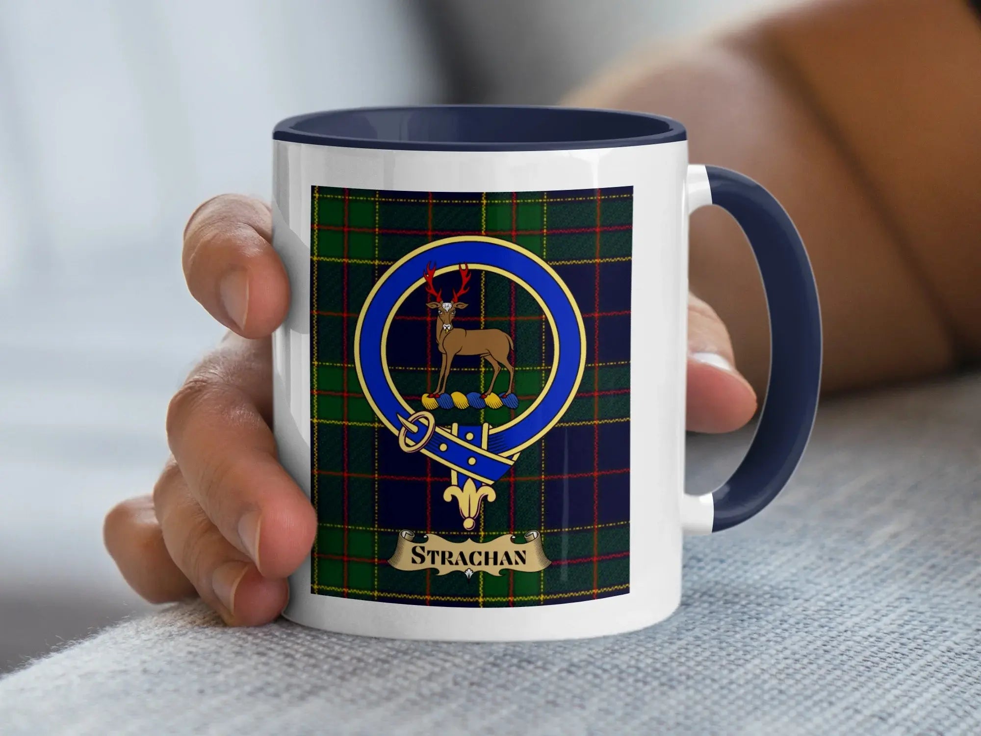 Strachan family crest coffee mug with a tartan-background design