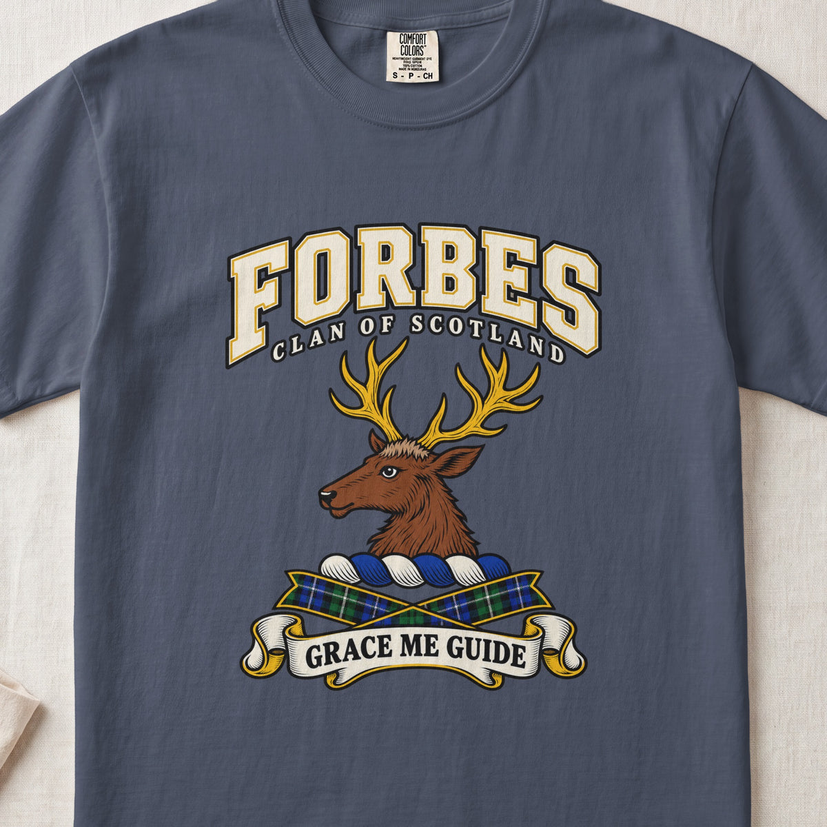 Forbes graphic T-shirt in Midnight blue, front flat lay showing varsity lettering and brown stag head with gold antlers.
