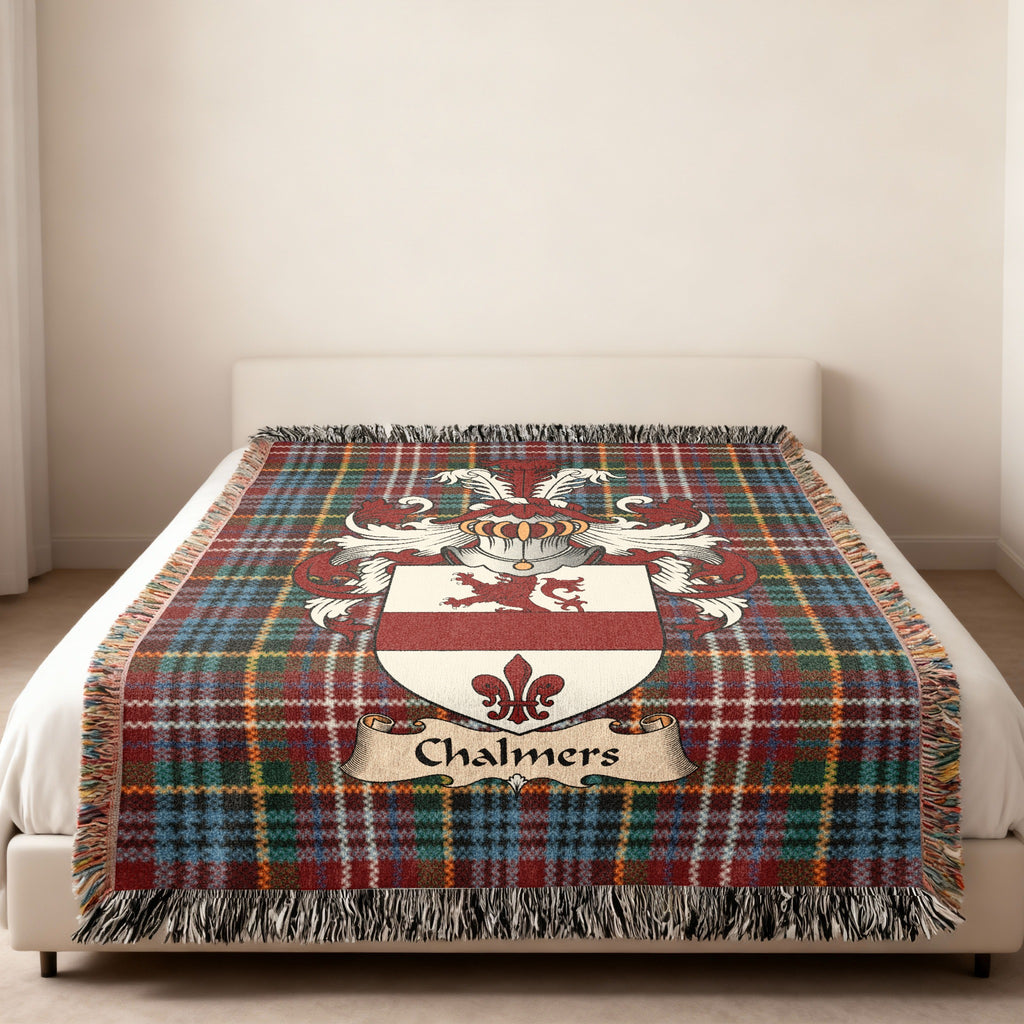 Chalmers Scottish family shield woven blanket on a Caledonia tartan background
