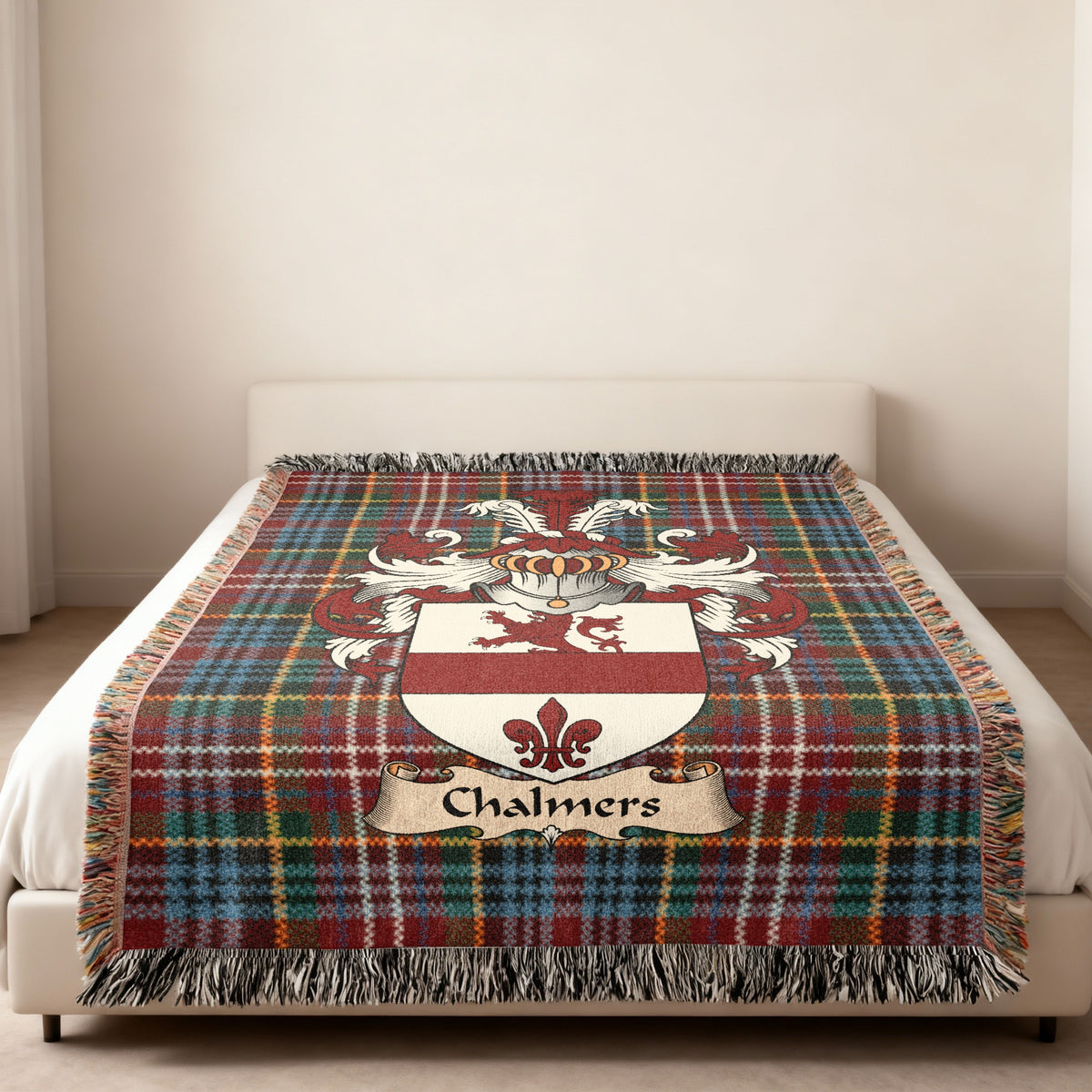 Chalmers Scottish family shield woven blanket on a Caledonia tartan background