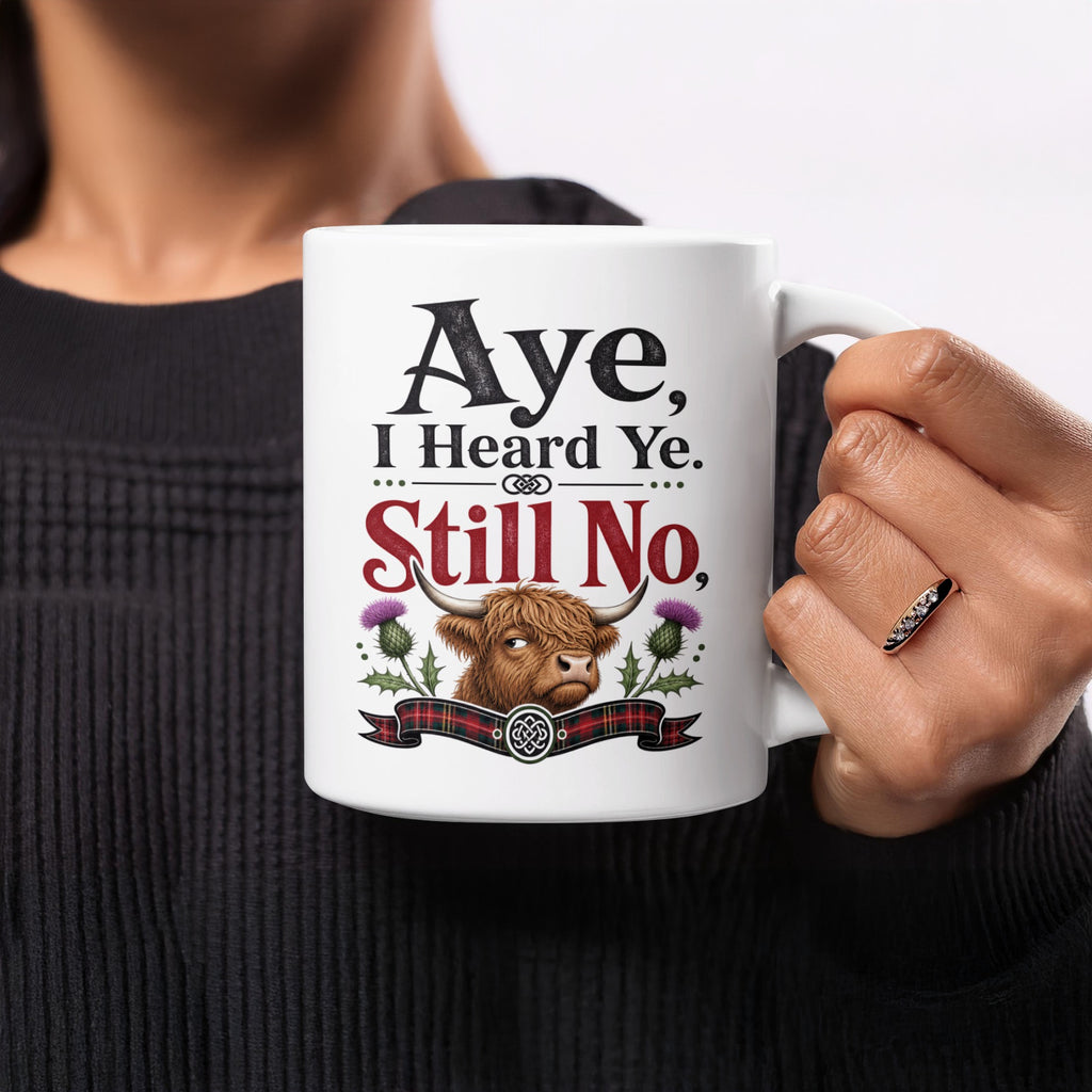 Mug with Highland cow and text "Aye, I Heard Ye. Still No."