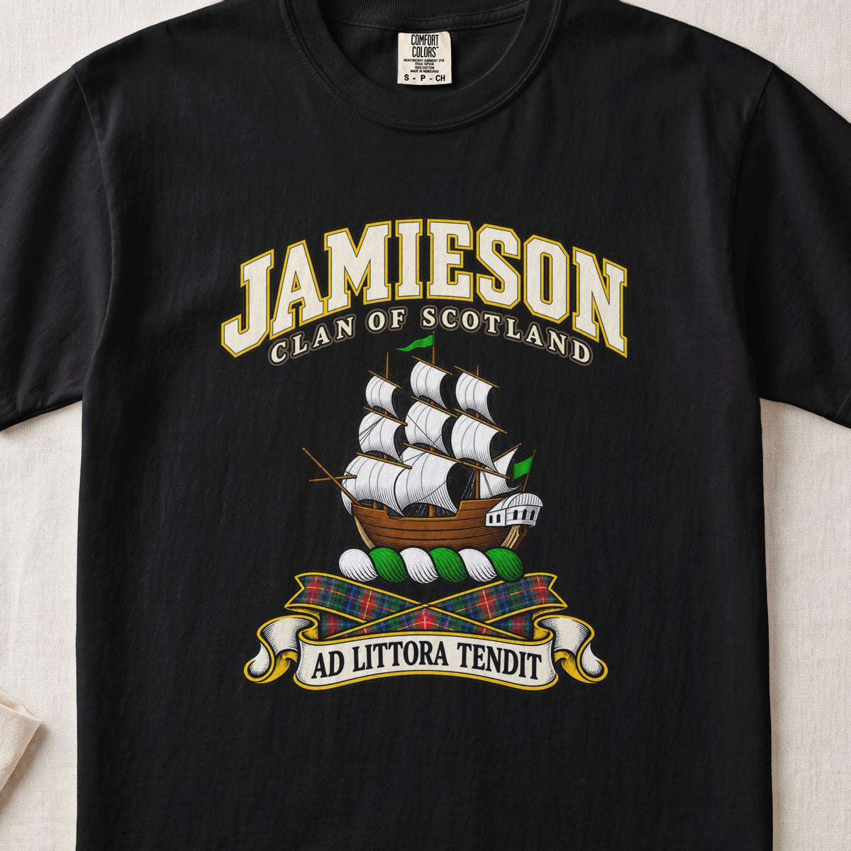 Jamieson Scottish clan T-shirt in Black, front view with a sailing ship with white sails and green pennants and motto banner.