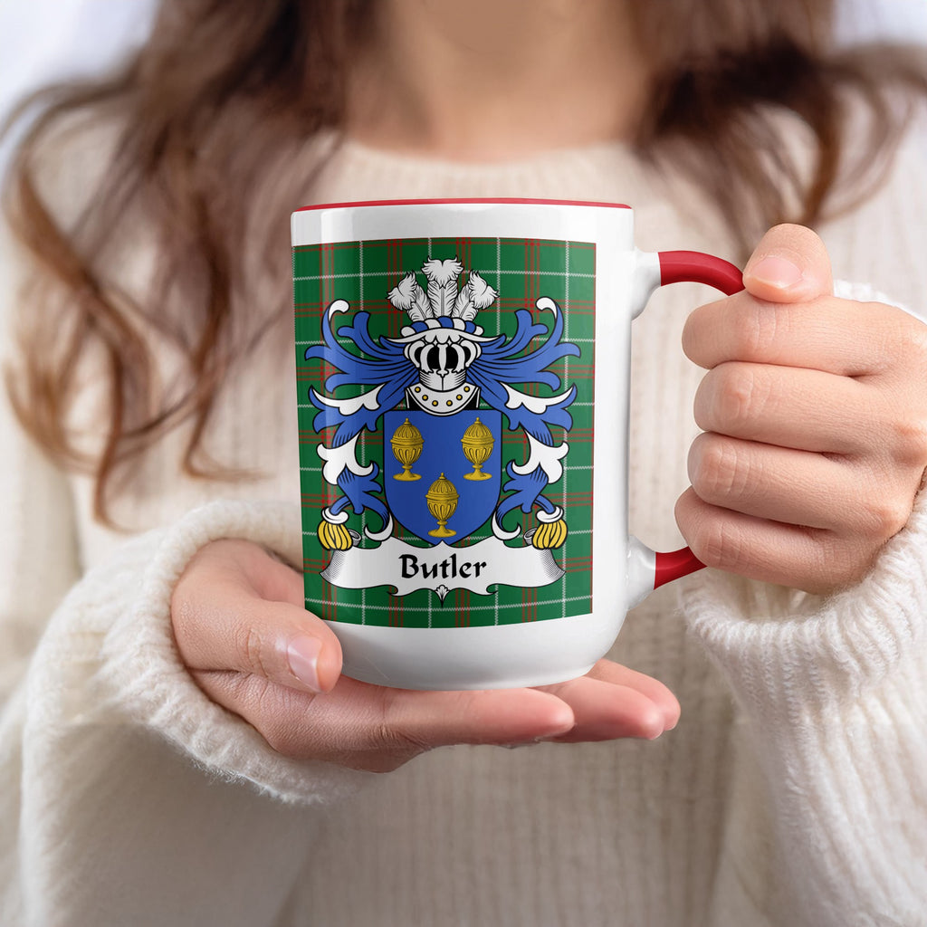 White mug with red accents featuring a family crest and the name "Butler."