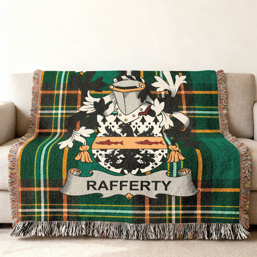 Green plaid throw blanket with Rafferty family crest and name.