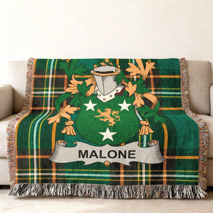 Green tartan throw blanket with Malone family crest and name.
