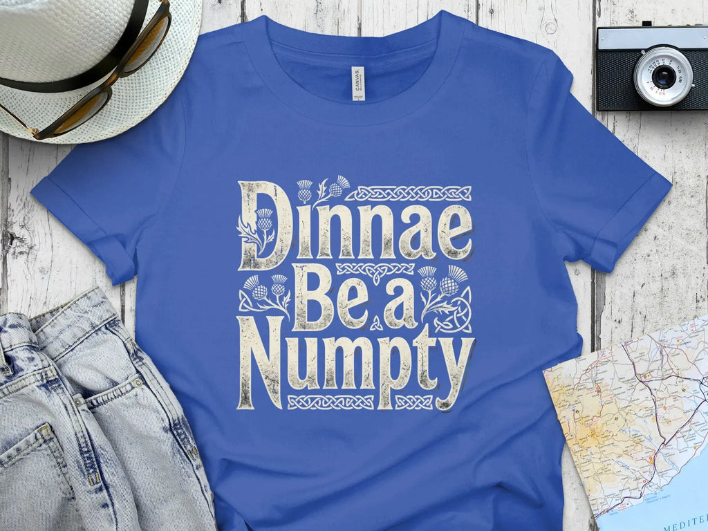 Blue t-shirt with "Dinnae Be a Numpty" text and Celtic knot design.