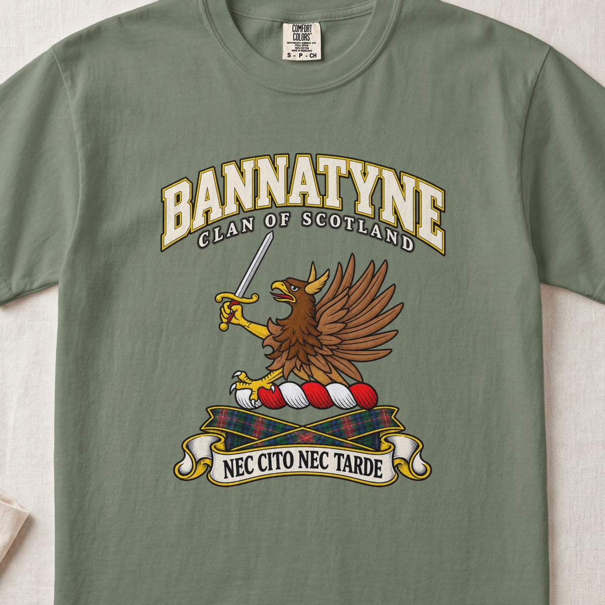 Bannatyne Scottish clan T-shirt in Moss, front view with a brown eagle holding a sword and motto design.