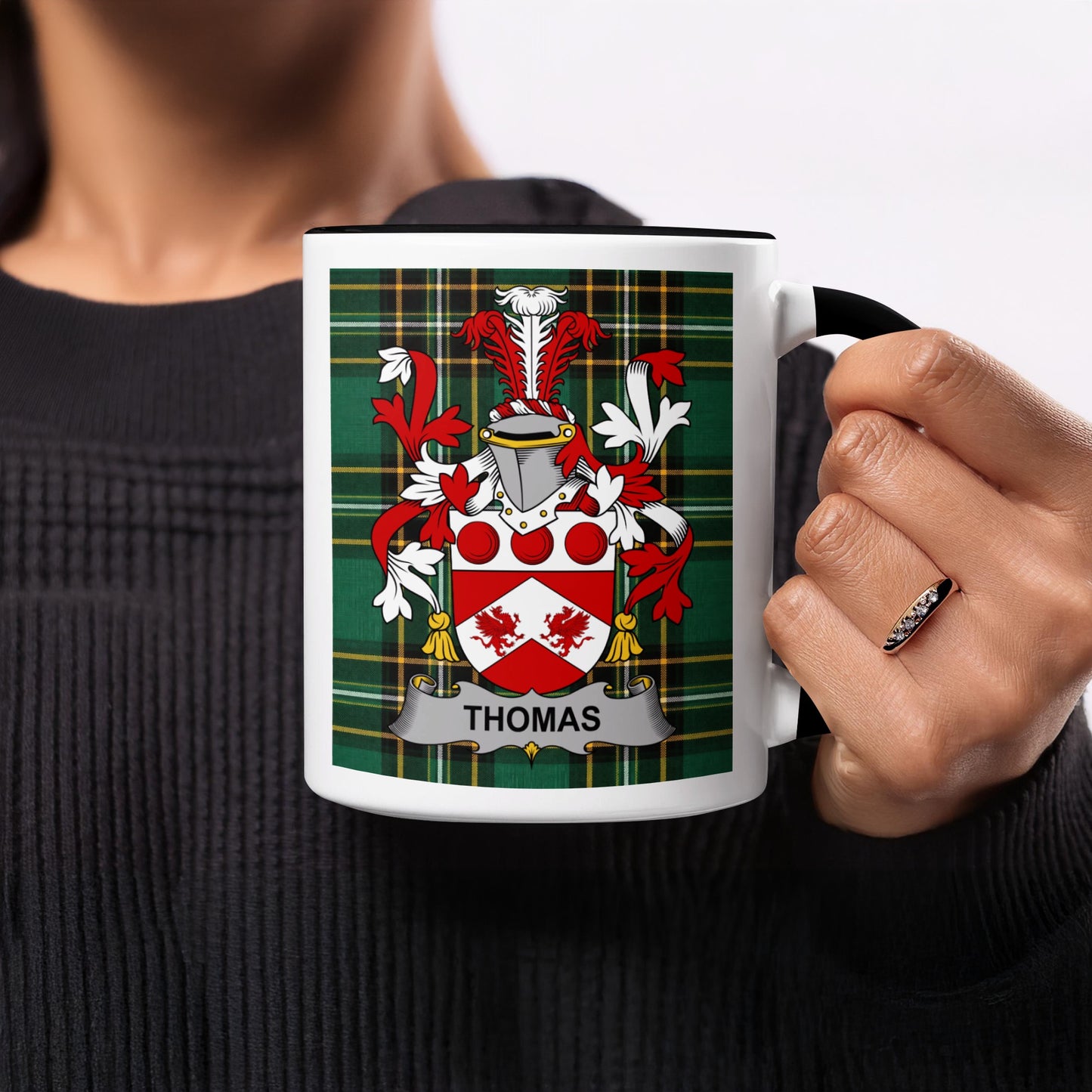 Mug featuring the Thomas family crest on a green plaid background.