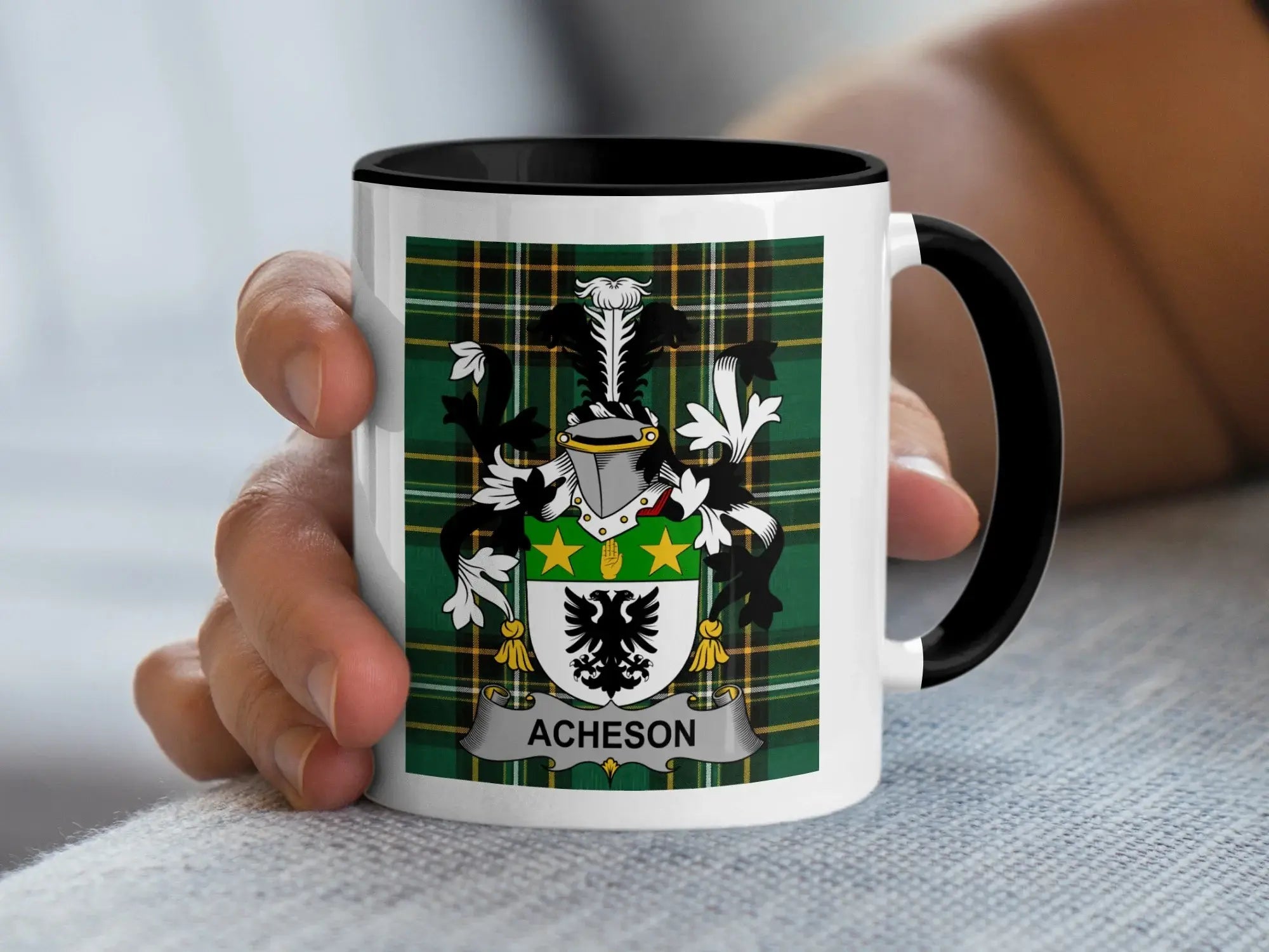 Acheson Irish family crest accent mug with black handle on Irish National Tartan