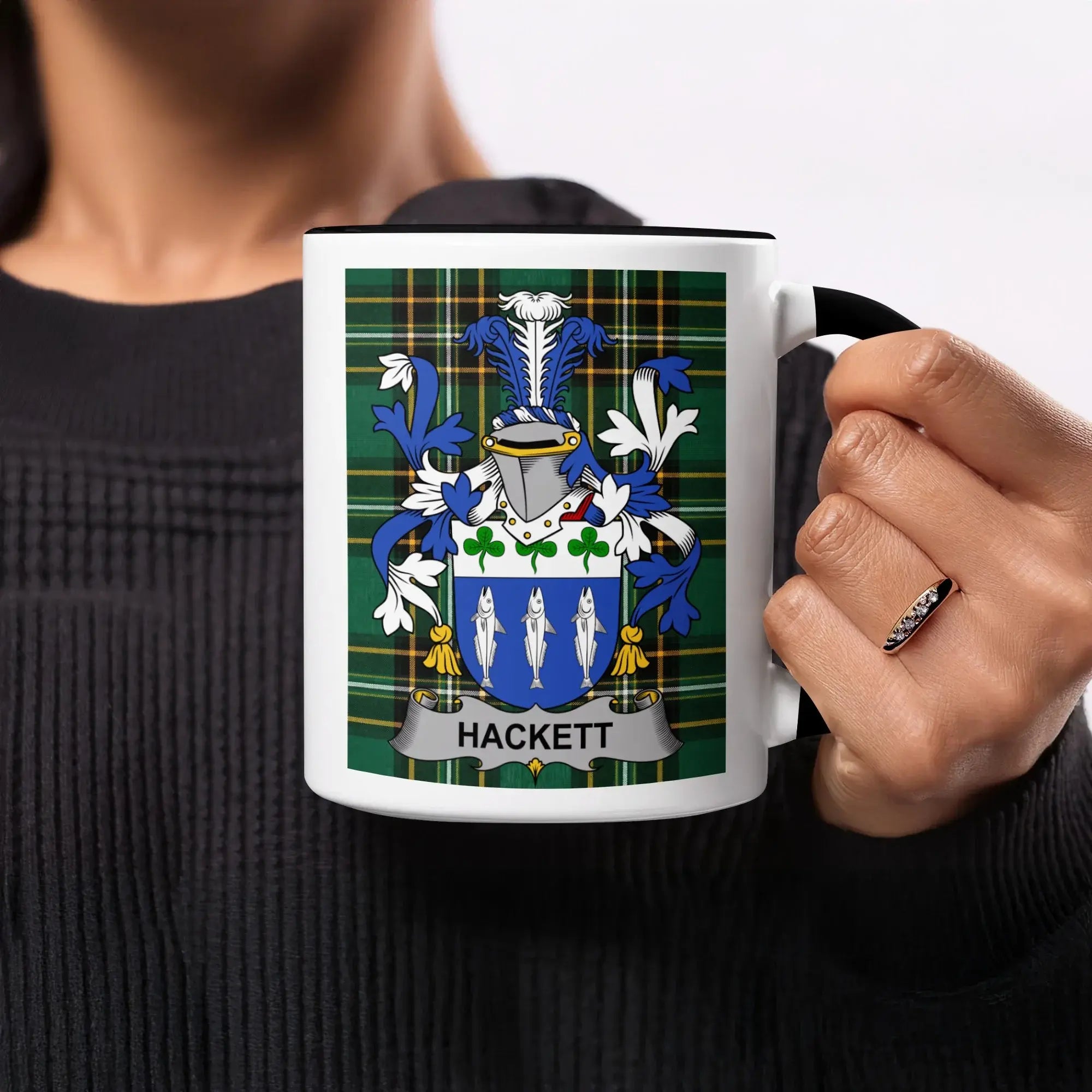 Mug with Hackett family crest on a tartan background.