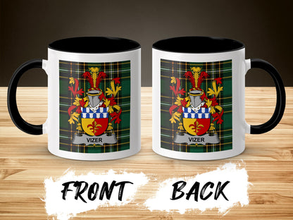 Two mugs displaying the Vizer coat of arms on a plaid pattern.