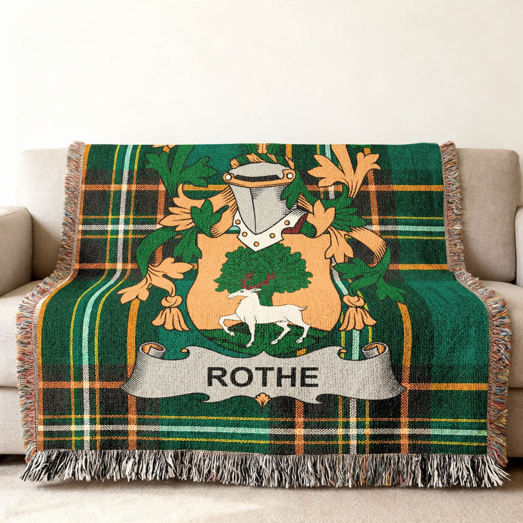 Green plaid blanket with Rothe family crest featuring a deer.