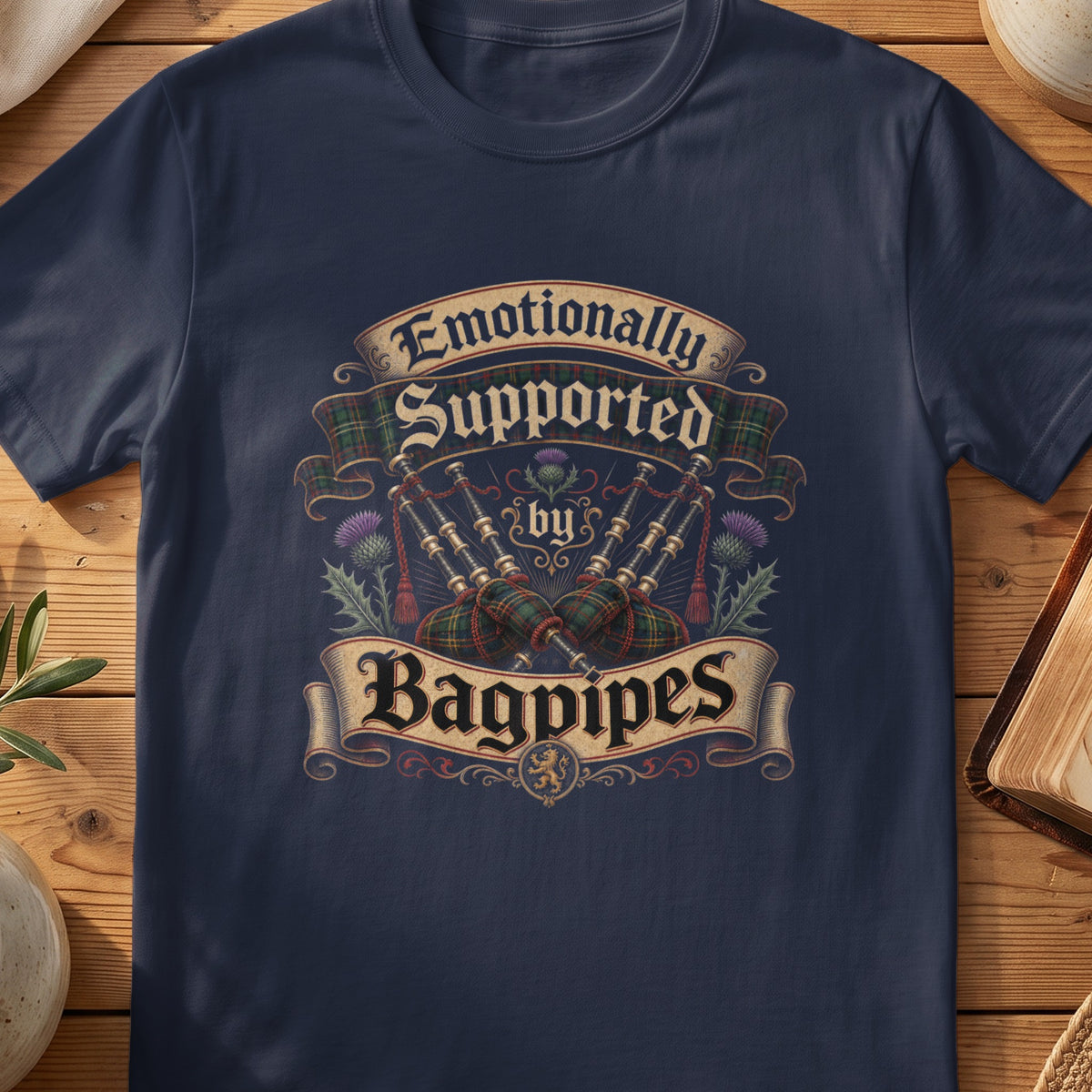 Navy Gildan 64000 unisex T-shirt flatlay with Emotionally Supported by Bagpipes Scottish graphic design