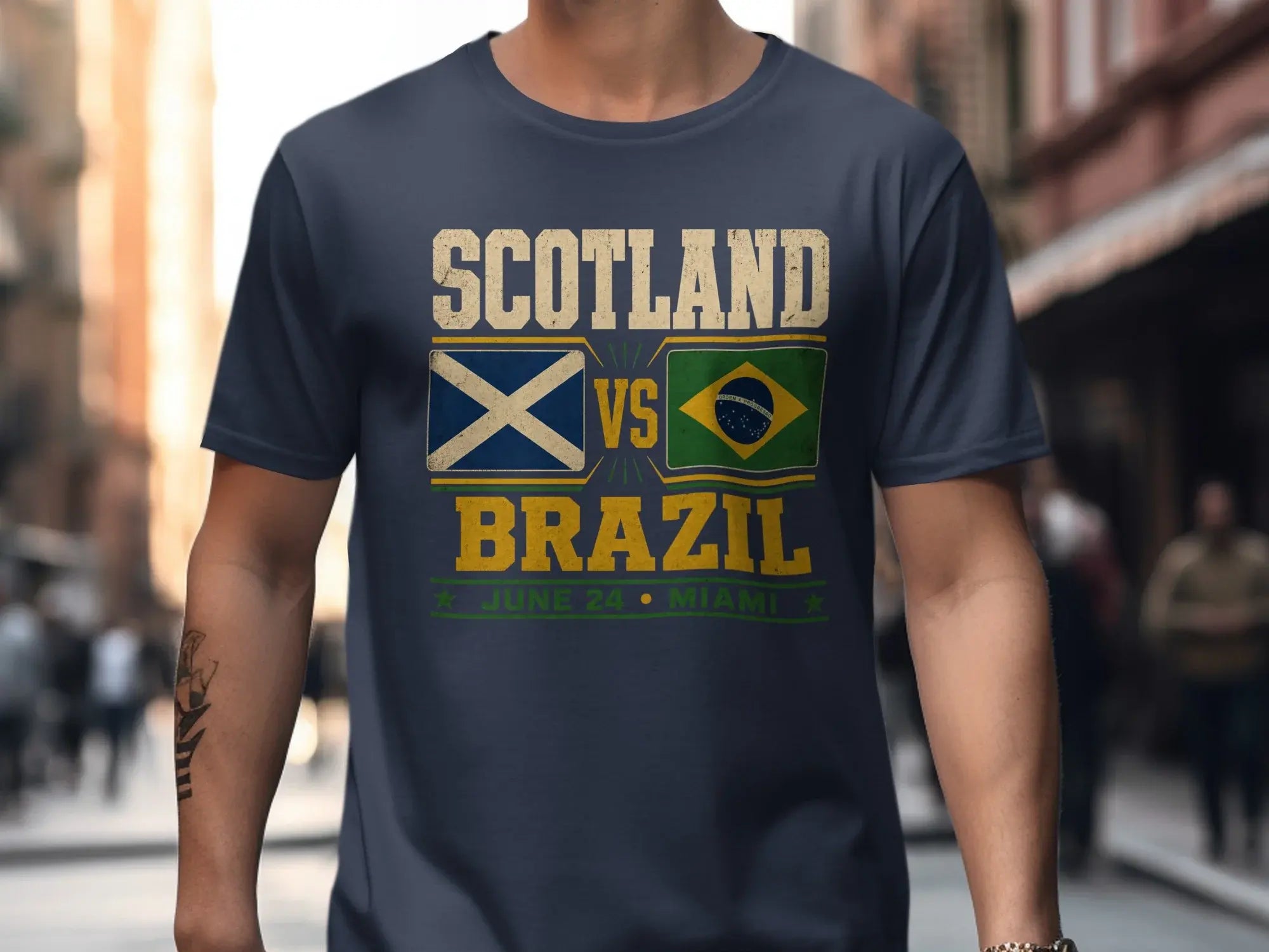 Dark blue t-shirt with Scotland vs Brazil flags and text.