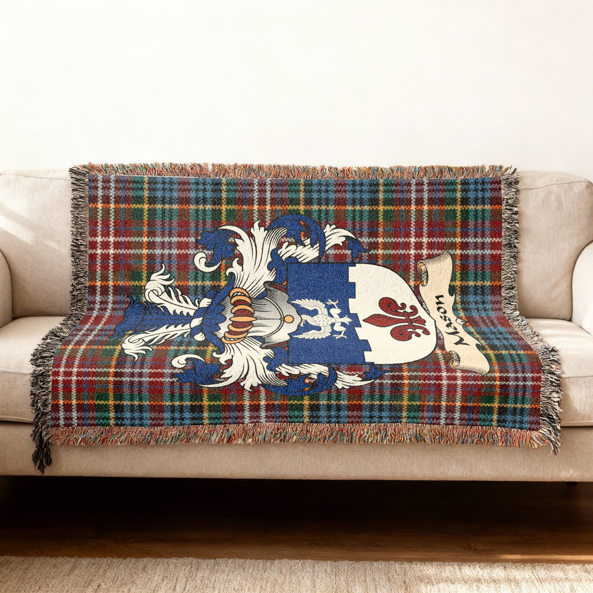 Mason Scottish woven blanket with family shield and Caledonia tartan background