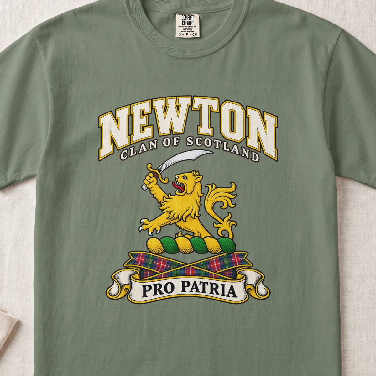 Newton Scottish clan T-shirt in Moss, front view with a gold lion holding a curved sword and motto banner.