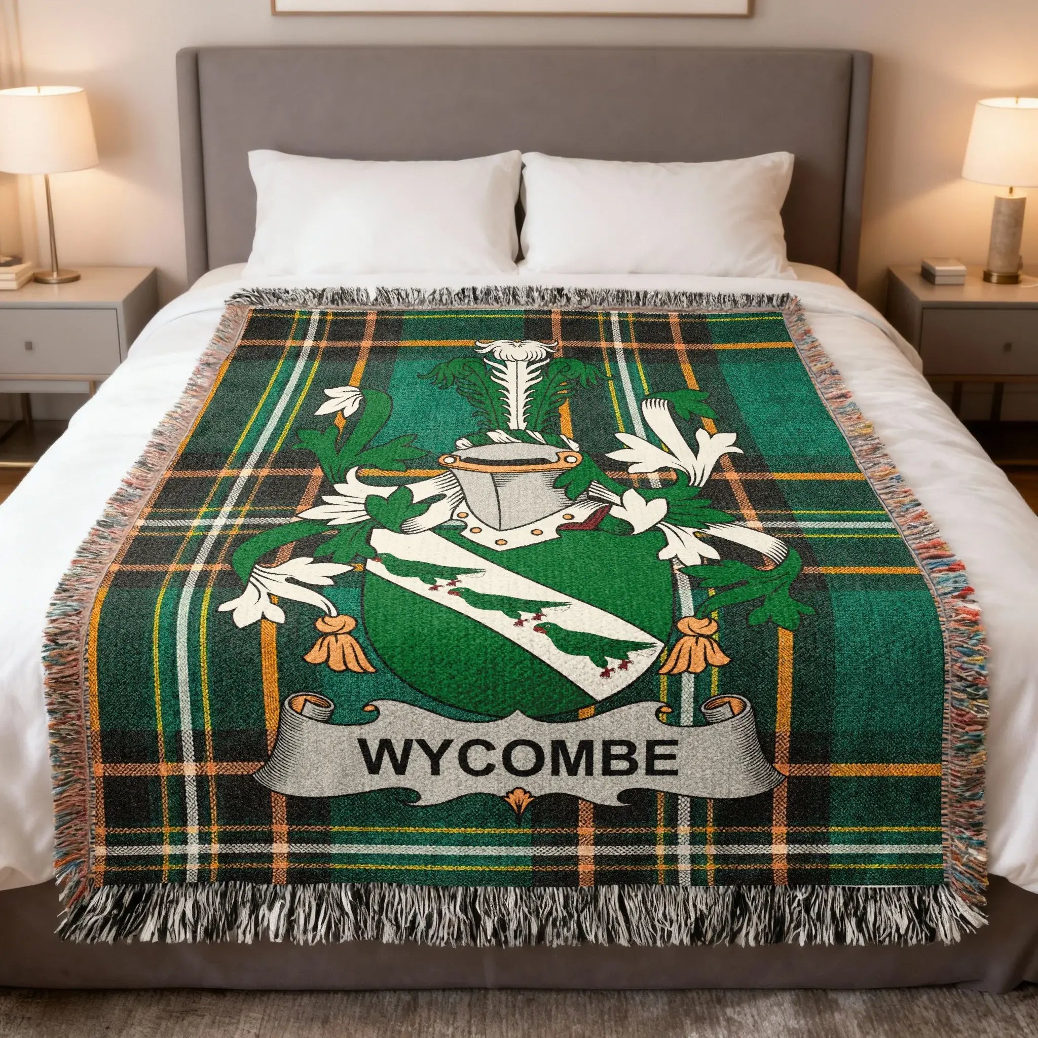 Green and white Wycombe coat of arms on a plaid blanket.