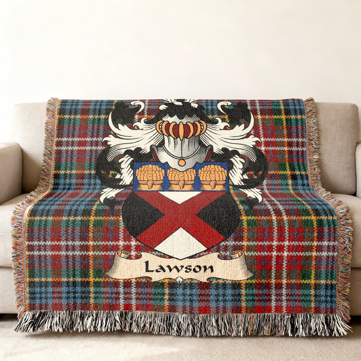 Lawson family crest emblem on a Caledonia tartan woven blanket