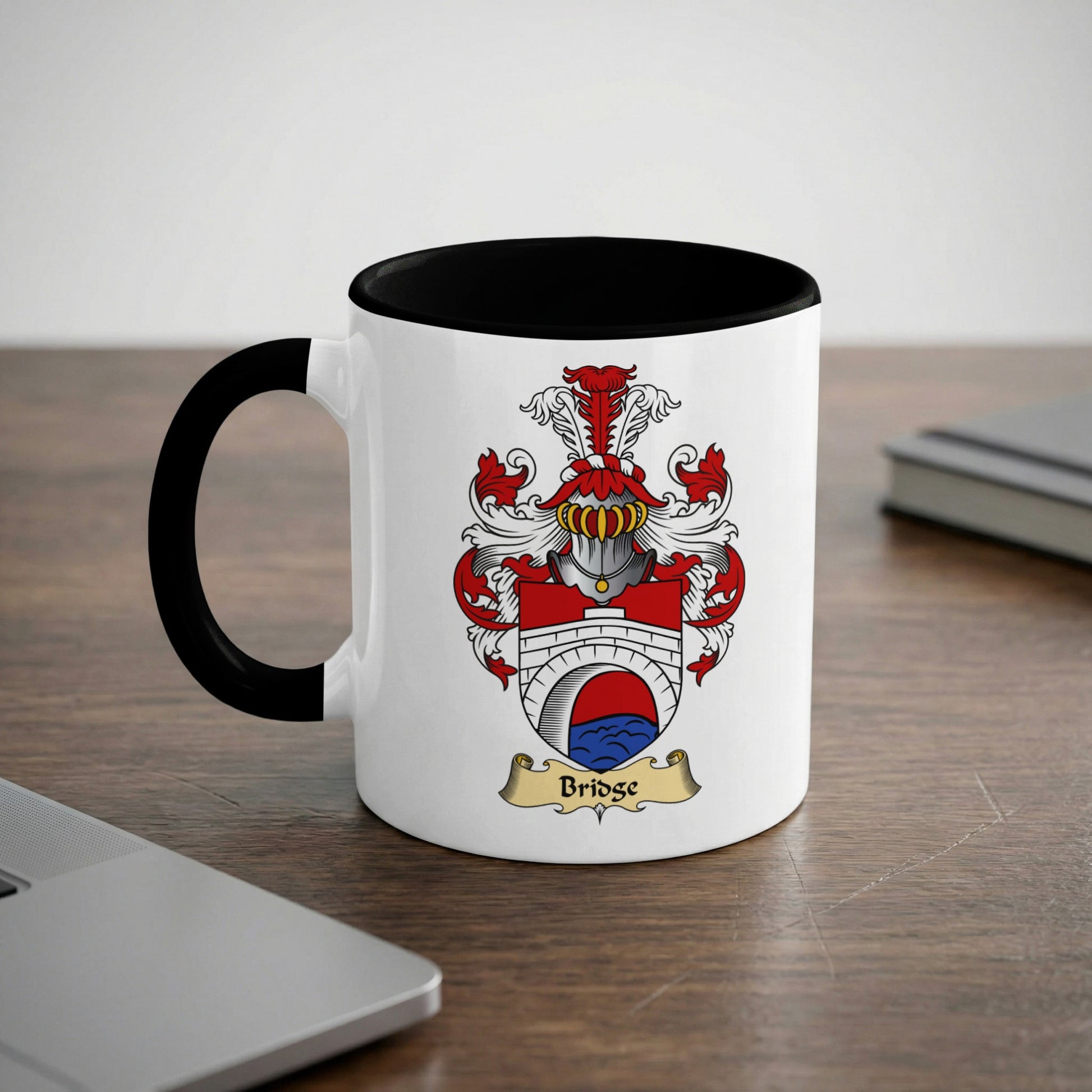 White mug with black rim featuring a coat of arms with "Bridge" text.