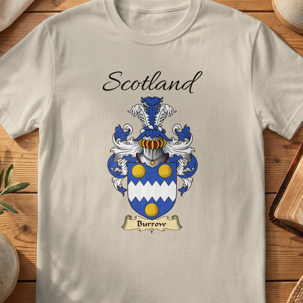 Sand Burrow Scottish family shield T-shirt featuring a white zigzag band between gold circles on blue