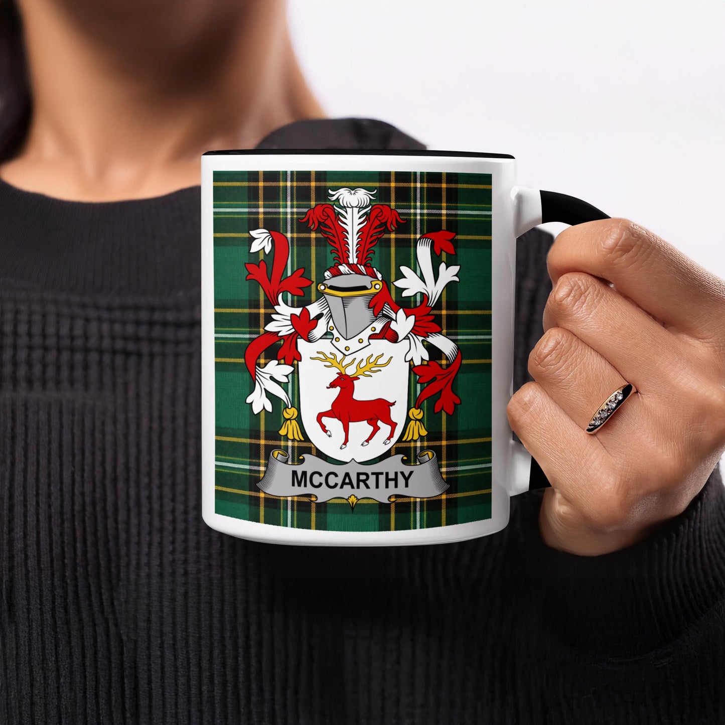 McCarthy crest on a mug with a tartan background.