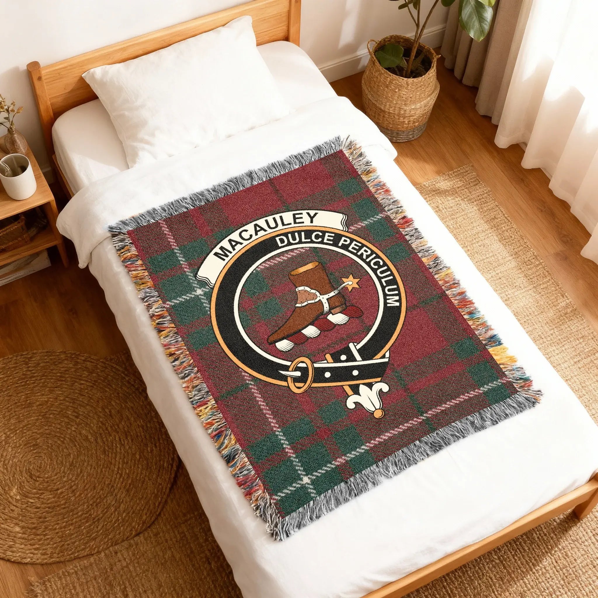 Clan MacAulay tartan woven blanket — folded showing fringe detail and crest, Dulce Periculum motto