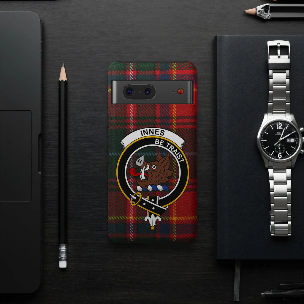 Innes Be Traist crest plaid smartphone case flat lay — full boar's head clan design visible