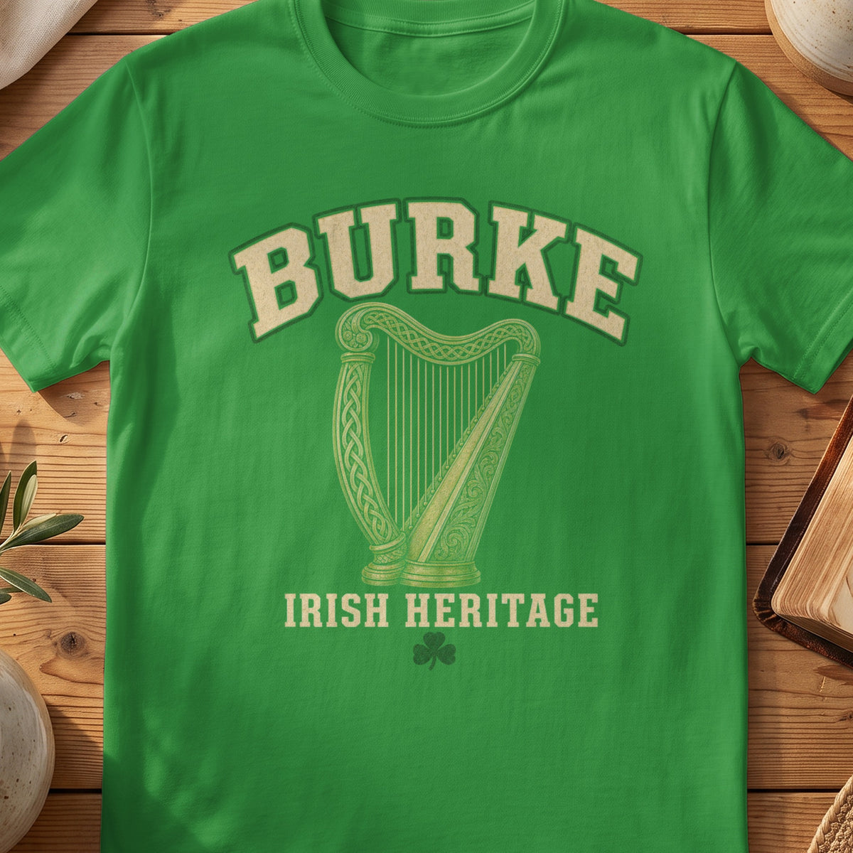 Burke Irish harp T-shirt in Irish Green, with cream surname lettering, a gold-toned harp, green shamrock and “Irish Heritage” text.