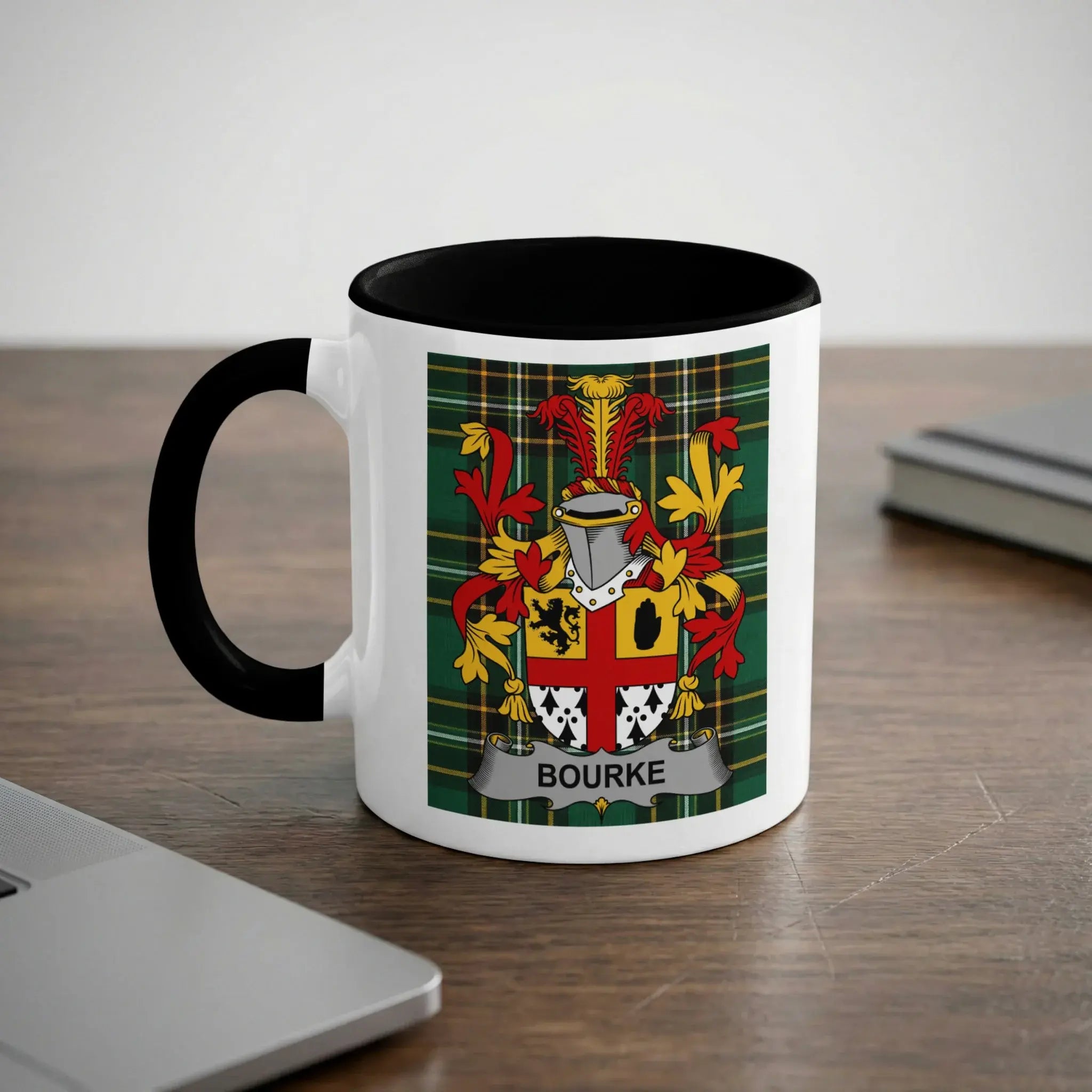 White mug with black rim featuring the Bourke family crest and tartan pattern.