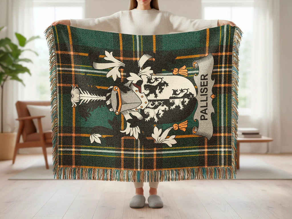 Tartan throw with a coat of arms featuring a lion and shield, text "PALISER".