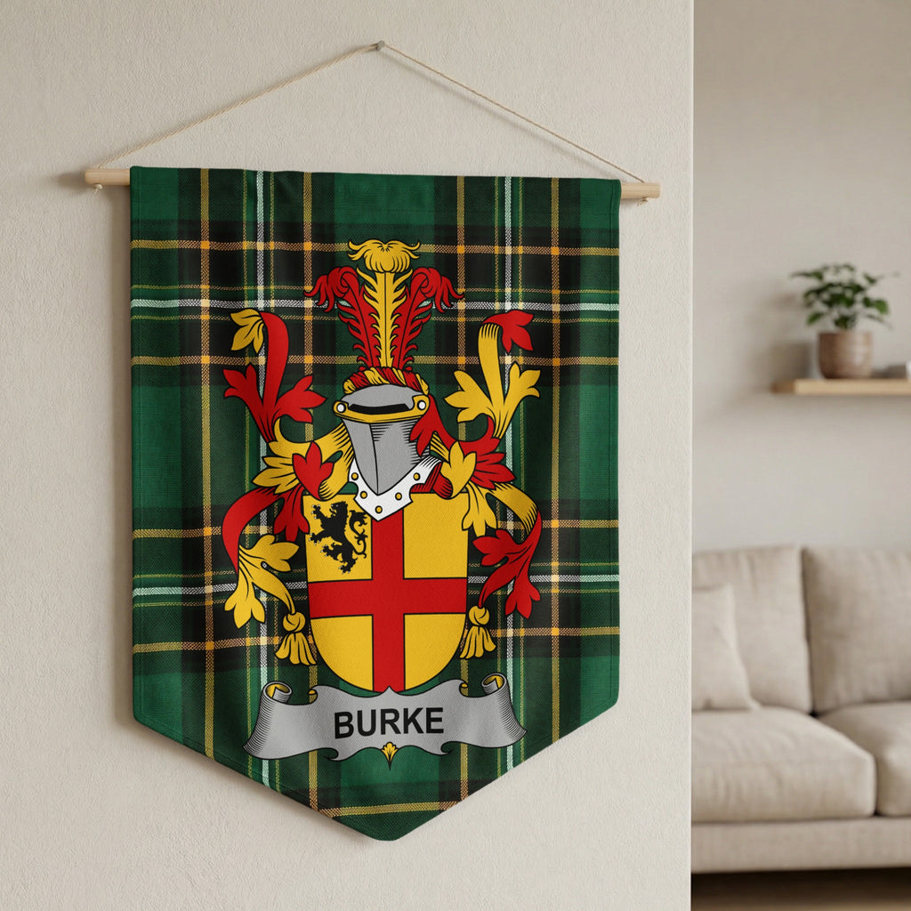 Burke surname emblem banner on green tartan fabric hanging on a wall.