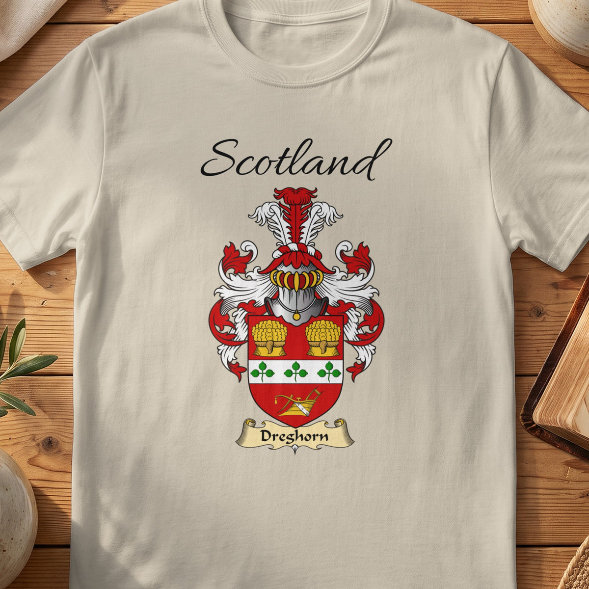 Sand Dreghorn Scottish family shield T-shirt featuring a red shield with a clover-patterned white band