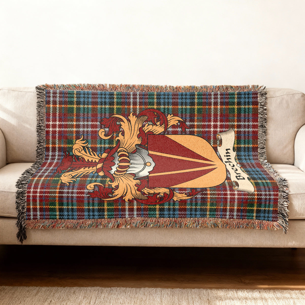 Brechin Scottish woven blanket with family shield and Caledonia tartan background