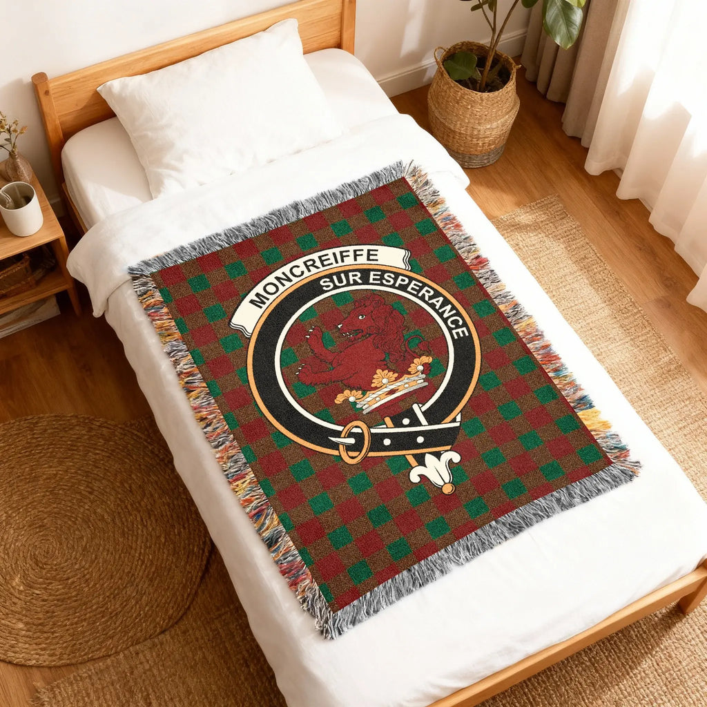 Moncreiffe Sur Esperance tartan woven blanket on sofa — red and green clan colours in cotton