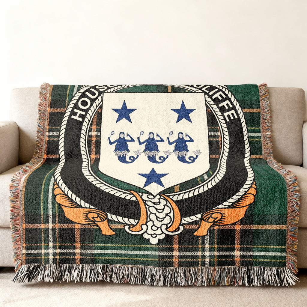 Macauliffe Irish National Tartan woven blanket displayed on a sofa