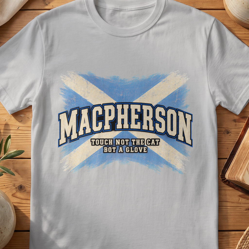 MacPherson Scottish Saltire T-shirt in Sport Grey, with distressed blue and cream flag and “Touch Not the Cat Bot a Glove” lettering.