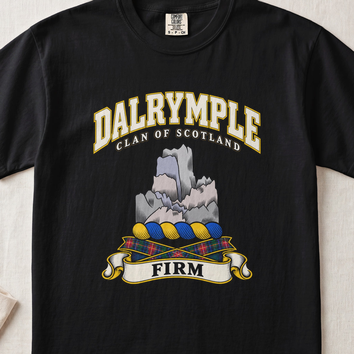 Dalrymple Scottish clan T-shirt in Black, front view with a gray rock formation and motto design.