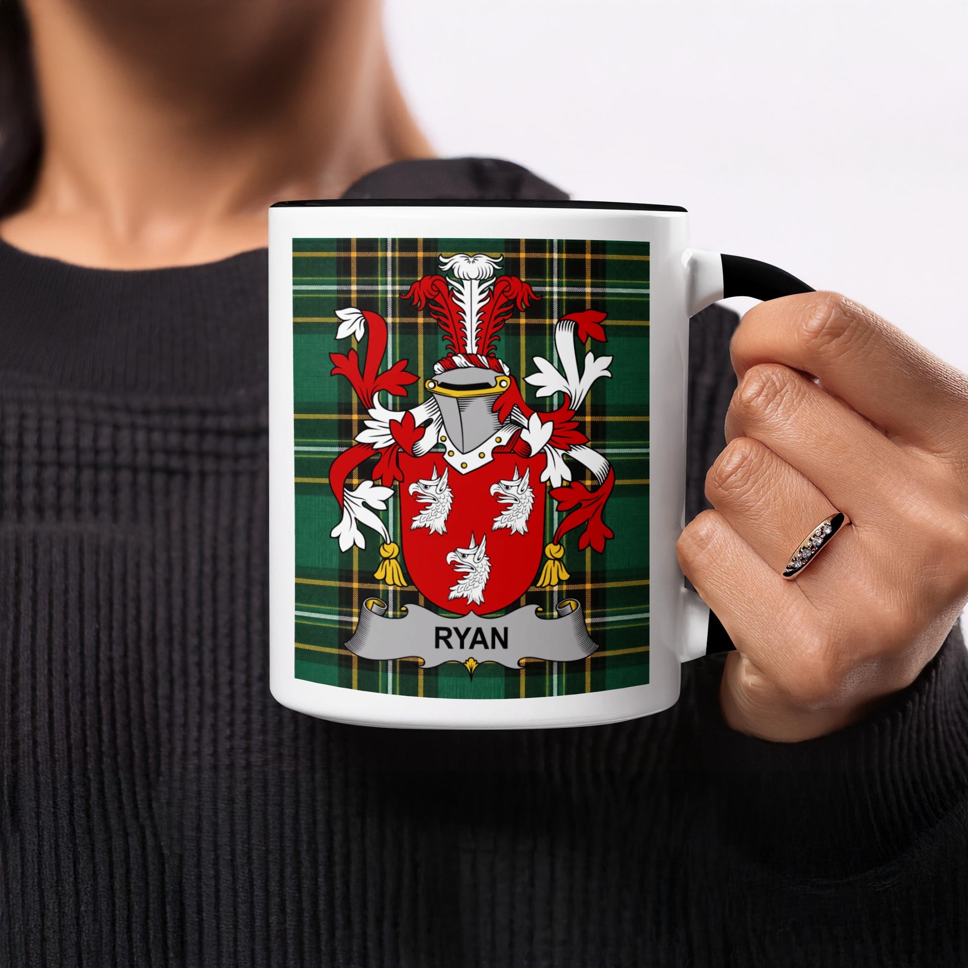 Mug with Ryan family crest and green plaid background.